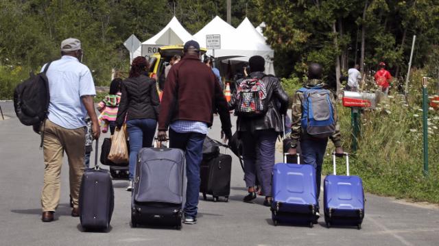 Haitians Flow Into Canada From The U.S.