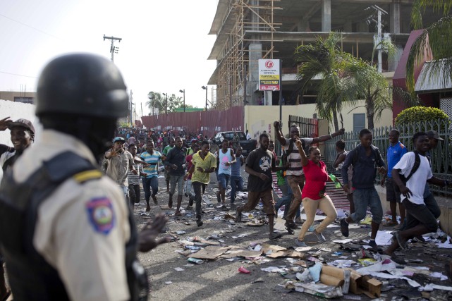 Depuis le 7 février les manifestations se sont multipliées à travers les principales villes de Haïti qui ont subi dimportants dégâts matériels. AP 1