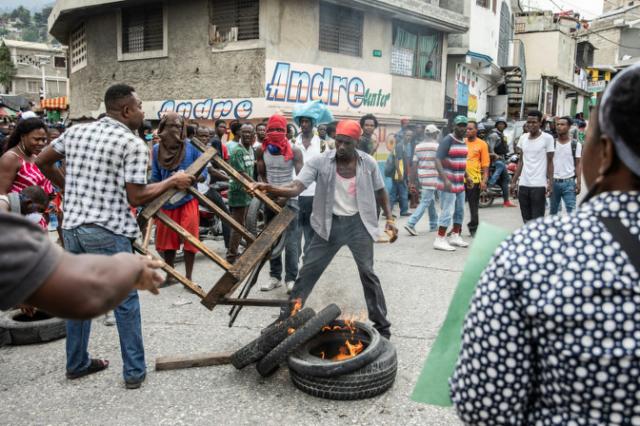 Demonstrations in the streets of Port au Prince in March 2019 demanding the removal of Haitian President Jovenel Moise AFP Photo Valerie Baeriswyl