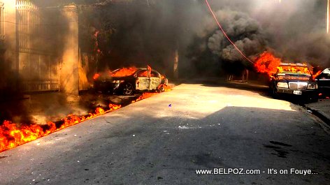burning cars around Radio Caraibes credit The Haitian Internet